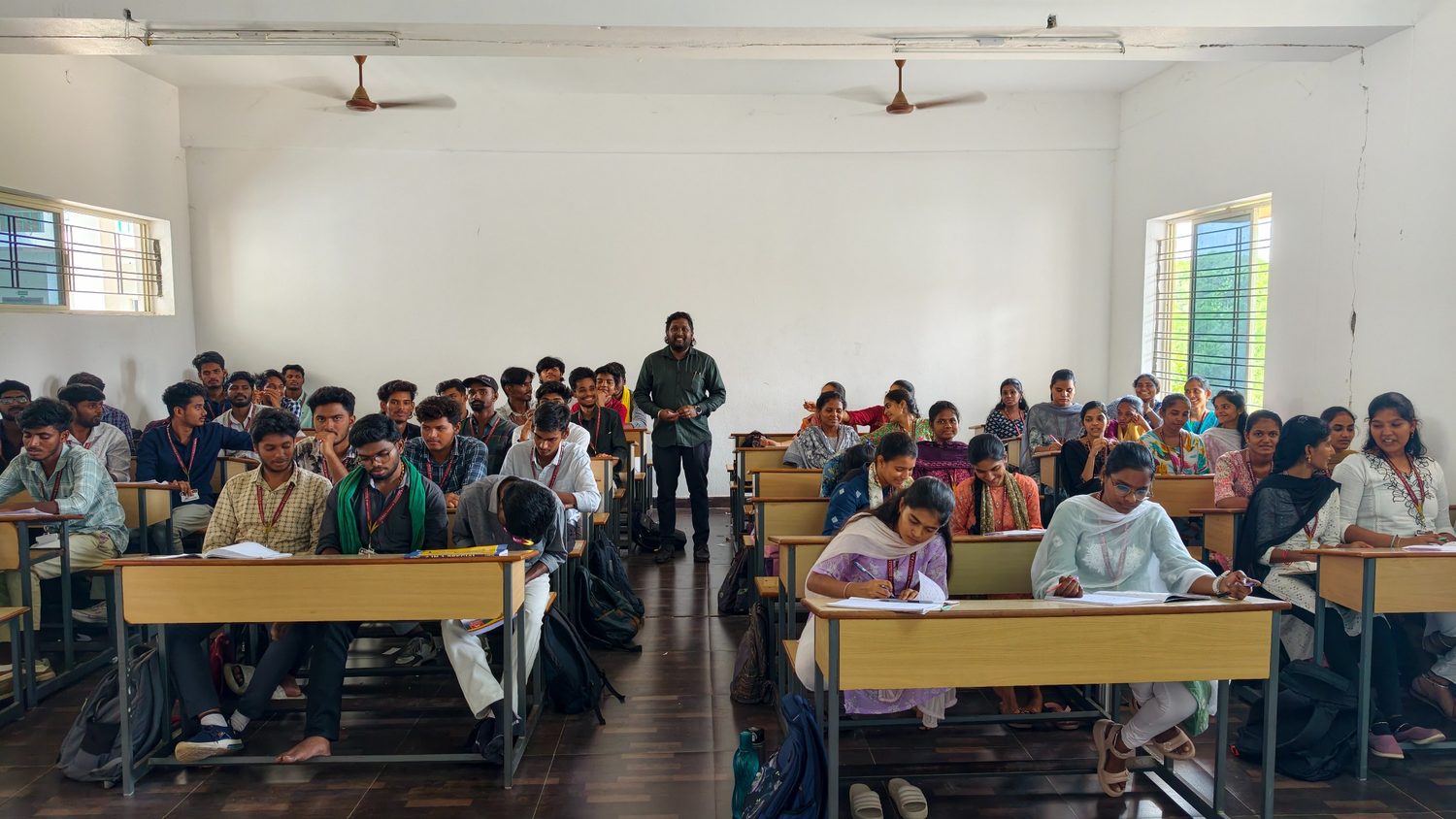 Students learning technical concepts in class